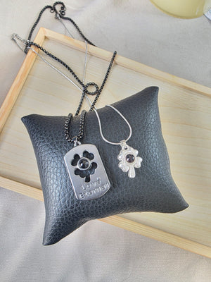 🍀 Collar de Pareja Trébol con Proyección “Te Amo en 100 Idiomas” 🍀